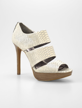 Remini Cutaway Snake Platform, regularly $128 (calvinklein.com)