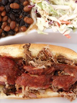 Barbecue and slaw give your tube steak extra oomph.  