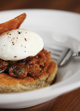 Trummer's on Main Chef Miller’s lusty duck confit and oyster hash.