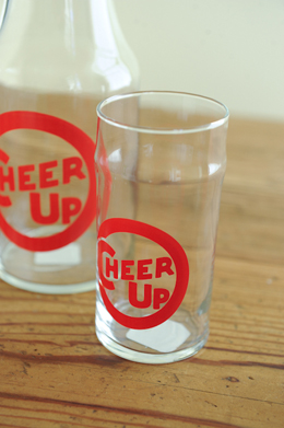 Cheer Up Glass, $5.50; Cheer Up Decanter, $12.95 Cheer Up Glass, $5.50; Cheer Up Decanter, $12.95