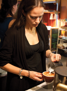 Clifton Cafe guest puts the finishing touches on her morning Joe. Clifton Cafe guest puts the finishing touches on her morning Joe.