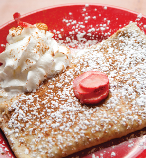 Tengesdal’s Eclectic Berry crepe sweetens the fruity pot with powdered sugar. Tengesdal’s Eclectic Berry crepe sweetens the fruity pot with powdered sugar.