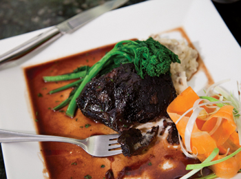 Ma works his magic on sous vide veal cheek and grilled rapini. Ma works his magic on sous vide veal cheek and grilled rapini.