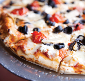 Del Ray Pizzeria Del Ray Pizzeria: The Hero, a briny affair with anchovies, black olives, feta