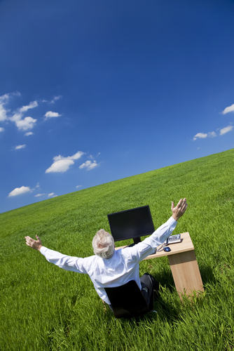 shutterstock_DarrenBaker desk in a field