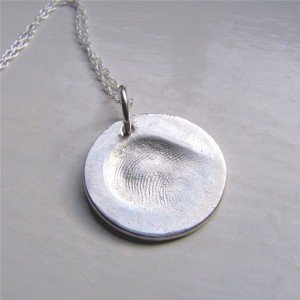 Fingerprint charm necklace by Etsy designer EarthshinesDesigns1 (Photo: etsy.com)