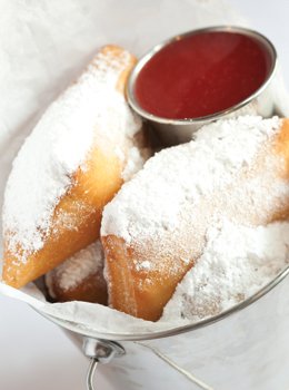 Fresh beignets with strawberry jam. 