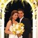 Newlyweds Carol Nguyen and Nhi Tran, donning their formal attire from Leesburg Bridal and Annalee’s Formals, pose under the Harbour View trellis adorned with flowers by Lavender Green for some post-ceremony photos.
