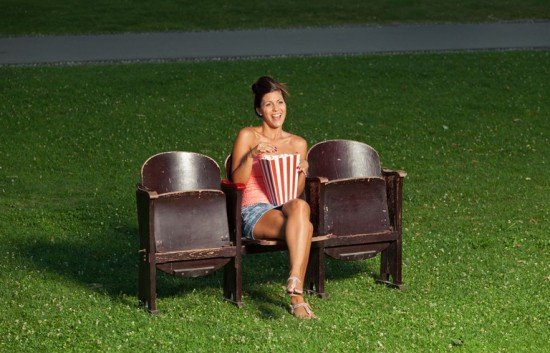 Woman watching movie outside