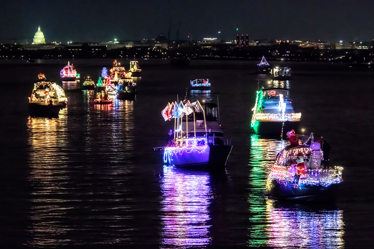boats lit up on potomac