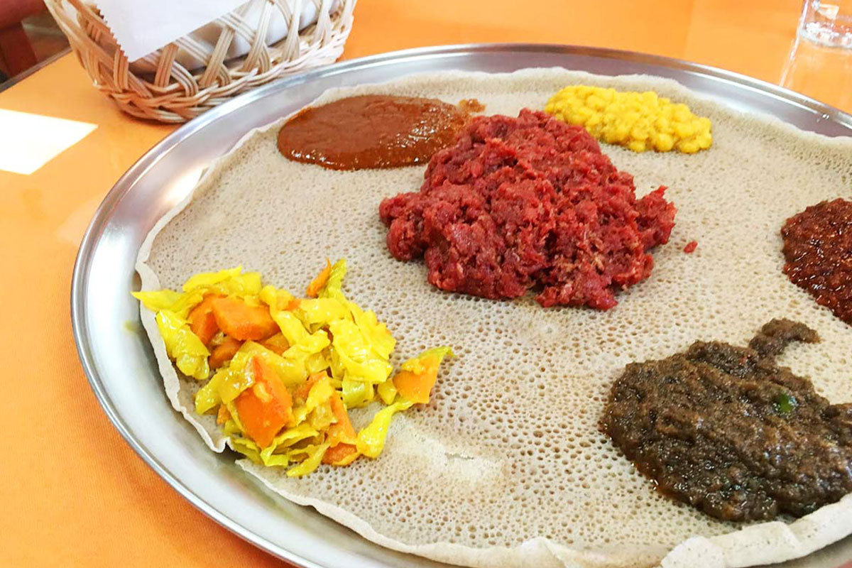 plate of thin bread with dips