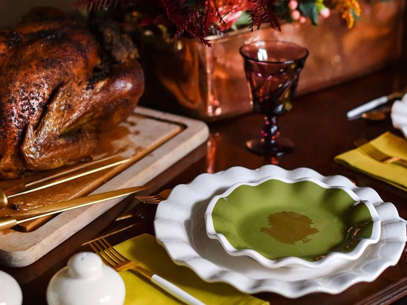 green and white plates on table