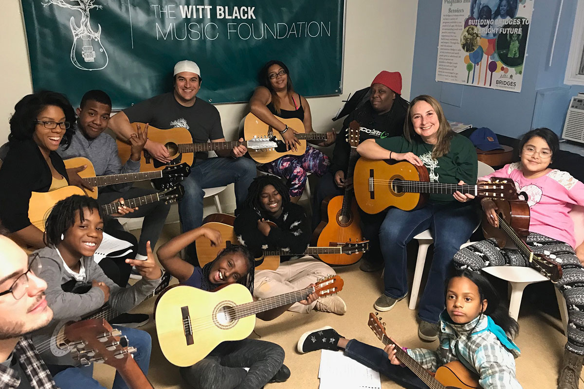 Westlake Legal Group group-learning-guitar-with-foundation The Witt Black Music Foundation inspires young musicians in NoVA Teaching Profiles nonprofit musicians music lessons Music guitar Education Culture Features Culture Community