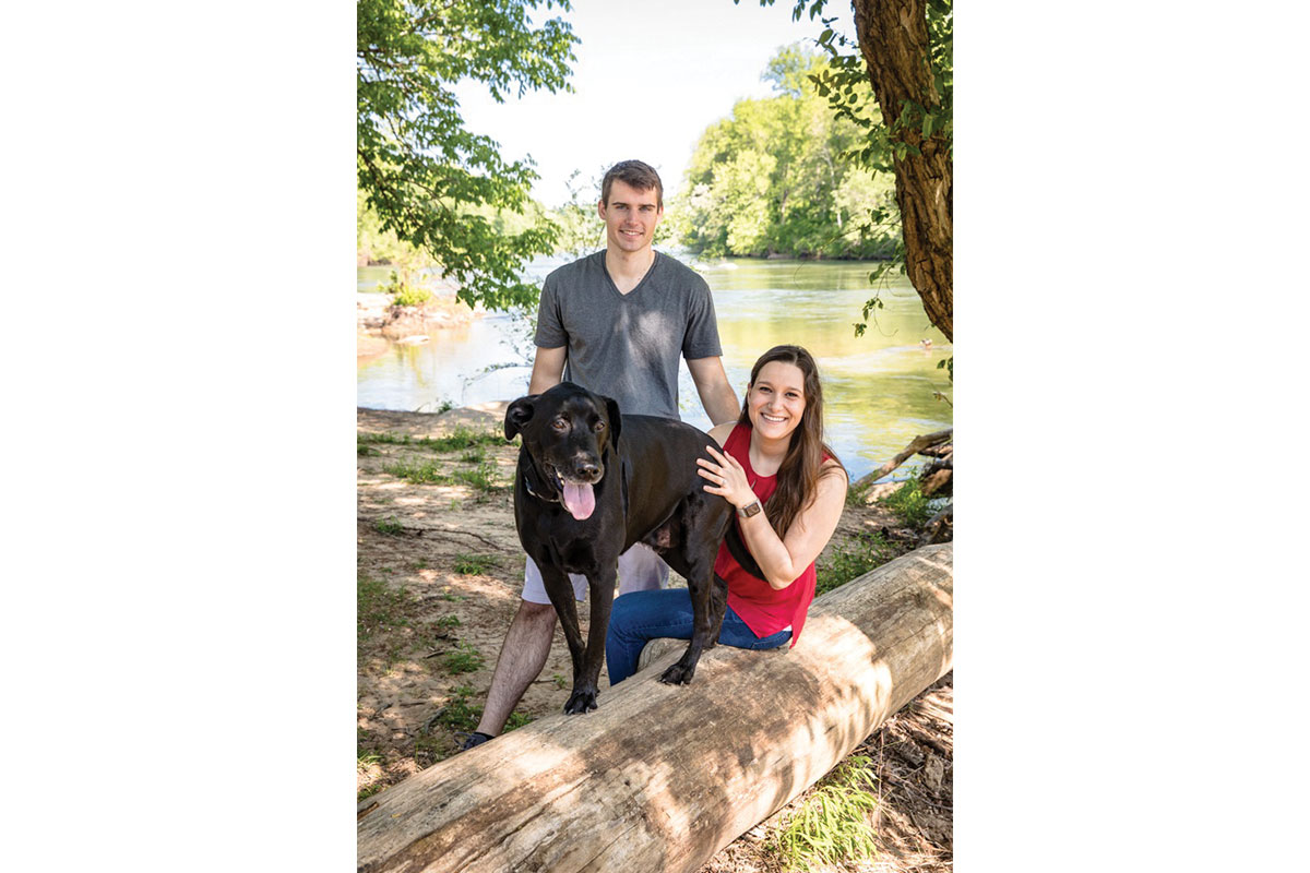 a couple with their dog