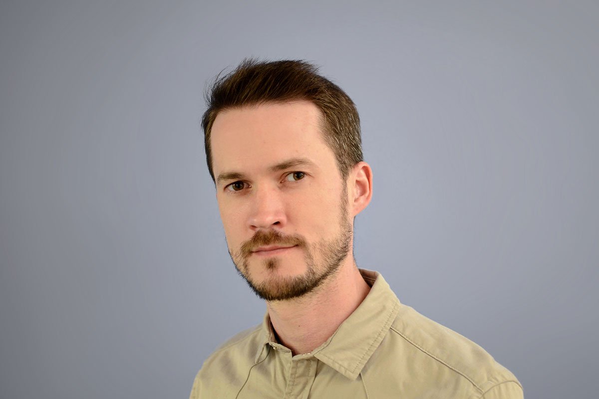 zach powers in front of grey background