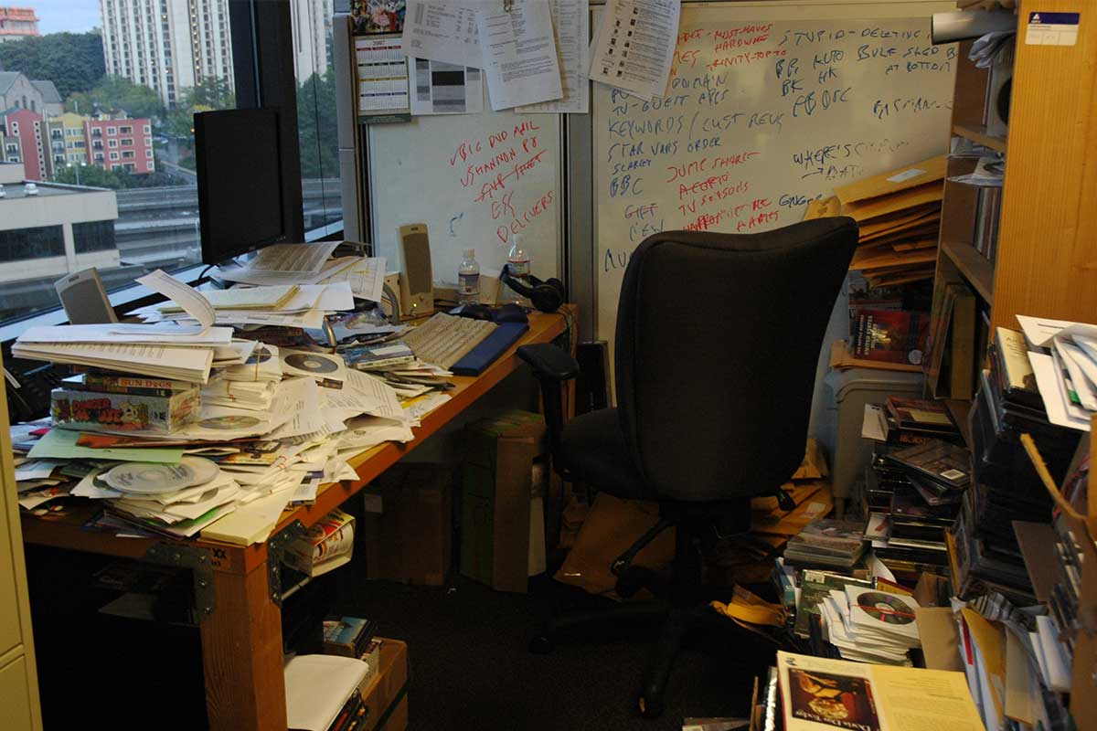 office with papers and a big mess
