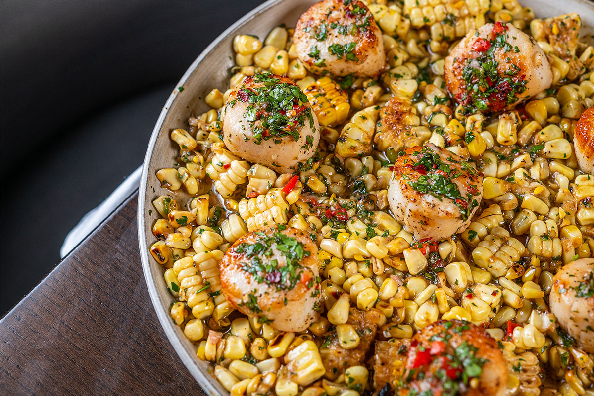 corn dish with scallops in it